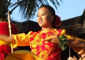 hawaiian woman dancing on stage.